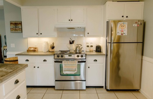 Plainwell House | Charming Serenity: A Cozy and Spacious Lake House Retreat Near Kalamazoo, MI.