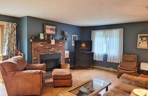 North Woodstock House | Close to shops/dining, river/town access, AC/fireplace, patio. A0008 by LRS