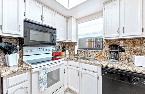 Avon By The Sea Condo | Coastal Bliss: Beachfront Condo w/Balcony, Pool & Near the Pier