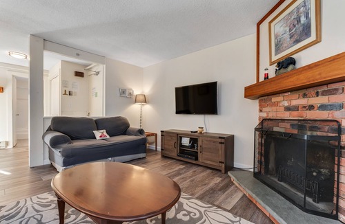Bromley Mountain Condo | Comfortable condo with pool & clubhouse fitness room, forest views