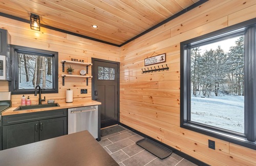 Norwich House | Cozy 2BR/1BA cabin for 6. Fireplace, outdoor fire pit, hot tub, and soaking tub.