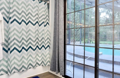 East Arlington House | Cozy 5BR Beach house-Jacksonville-Pet friendly, Heated Pool/Hot Tub & Family Fun