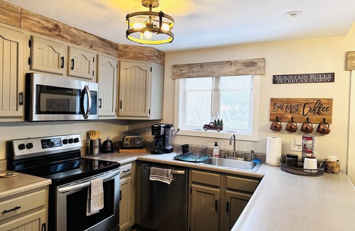 Lake Placid Condo | Cozy, relaxing condo overlooking Whiteface Club Resort near Jackrabbit trail.