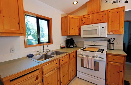 Florence Cabin | Cozy Tree‑lined Standard Cabins — 2BR, Sleeps 6, Private Covered Porches
