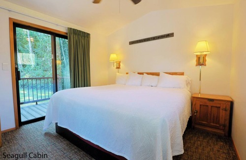 Florence Cabin | Cozy Tree‑lined Standard Cabins — 2BR, Sleeps 6, Private Covered Porches