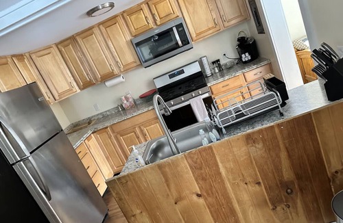Schroon Lake Hotel | Cozy two bedroom suite with 2 queen beds and a twin.