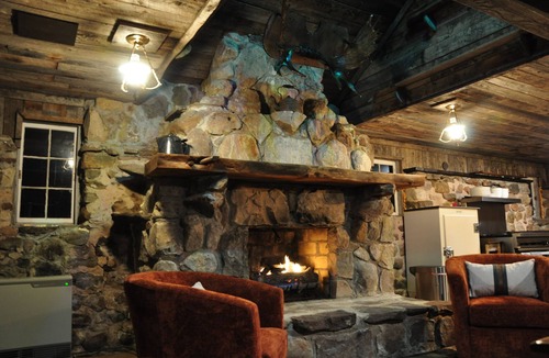Cleveland Cabin | Cozy up in this rustic Stone Lodge and relax by the fireplace