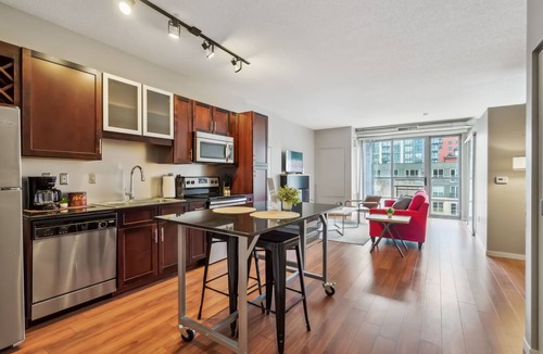 Mill District Apartment | CozySuites Mill District with pool, gym # 10