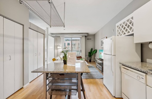 Mill District Apartment | CozySuites Mill District with pool, gym #06