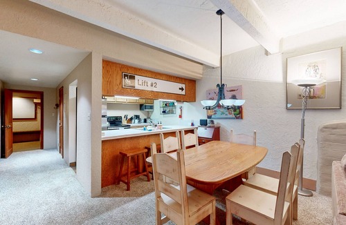 Taos Ski Valley Condo | Designer Forest-View Condo with Balcony, Wood Stove & Sunroom - Near Slopes