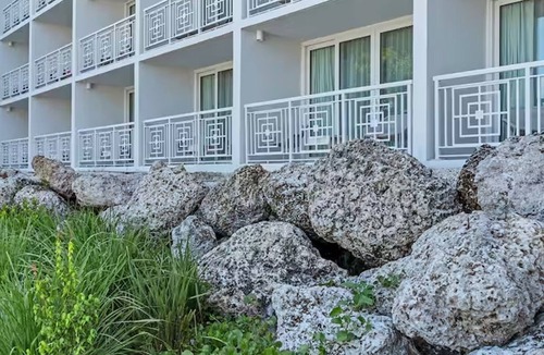 Rock Harbor Hotel | Dive Into Your Dream Beach Vacation! 2 Outdoor Pools, Pet-friendly Property!
