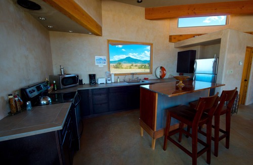 Youngsville House | Dual Master Bedroom: Designer Accommodations for the Long-Sta