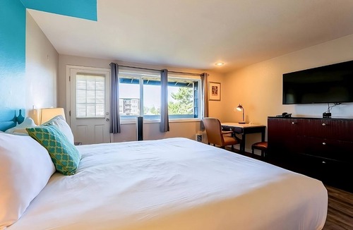 Seaside Hotel | Experience Relaxation in a Whimsical Room by the Riverfront