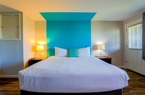 Seaside Hotel | Experience Relaxation in a Whimsical Room by the Riverfront