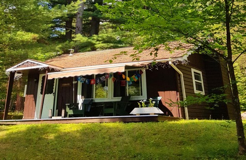 Wilmington Ski Chalet | Family Chalet with Fireplace under Pine trees