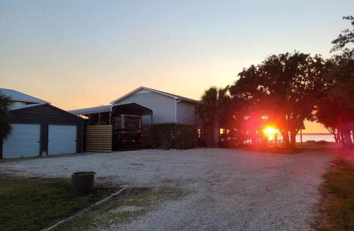 Florida Panhandle RV Rental | Florida Waterfront RV site w/Endless Sunsets on eastern shore of Escambia Bay.