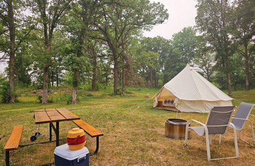 St Croix Falls RV Rental | Glamp Tent at Historic estate Big Rock Creek