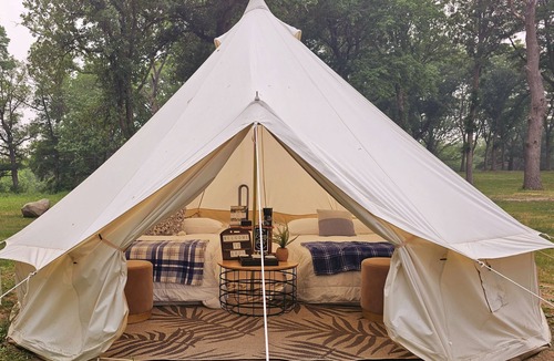 St Croix Falls RV Rental | Glamp Tent at Historic estate Big Rock Creek