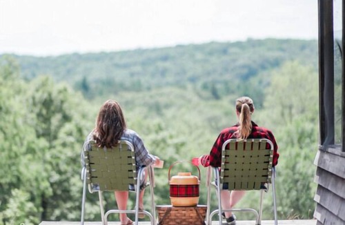 St Croix Falls RV Rental | Glamp Tent at Historic estate Big Rock Creek