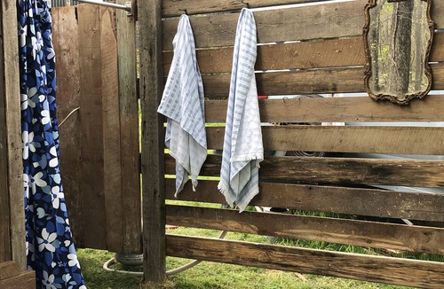 Cranston House | Glamping with sheep in a renovated 1972 Ace camper on 48 acres