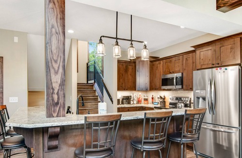 Eagle River Condo | Gorgeous, three-story condo with free WiFi, dock, theater room & lake access