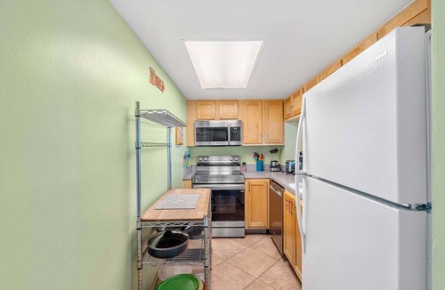 Avon By The Sea Condo | Ground Floor Retro Coastal Condo. Corner Unit By Pool & Steps to the Beach!🌴