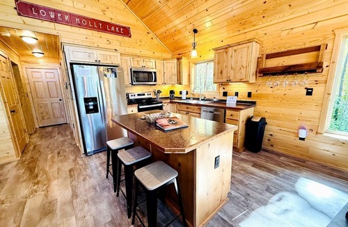 Stone Lake Cabin | Group Lake Cabin with Ping Pong Table Loaded with Kayaks in Wisconsin