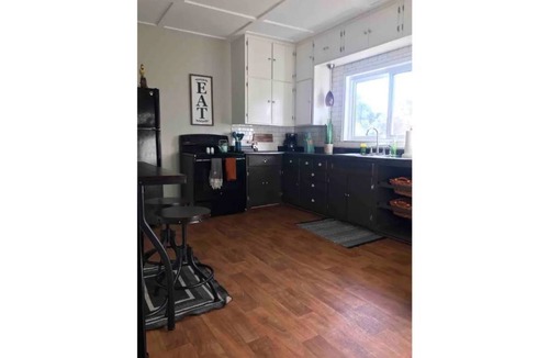 Tomah Apartment | Hot Tub! King Bed! Private & Spacious! Sleeps 3! Fully stocked Kitchen!