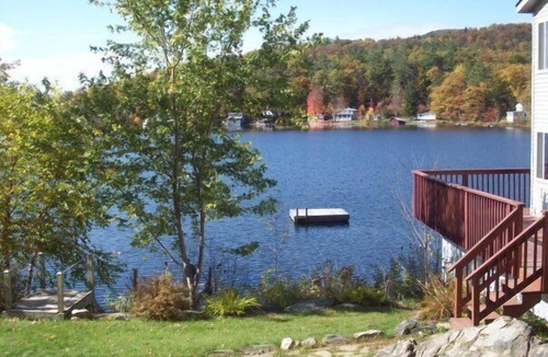Woodsville House | LAKE HOUSE on the water w/2 kayaks, canoe, huge deck, swim raft, dock, fire pit