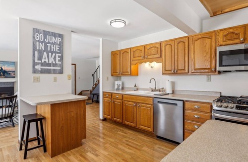 Ramsey County House | Lakefront Getaway: Hot Tub, Firepit & Fireplaces! 3 Bedroom Home by RedAwning
