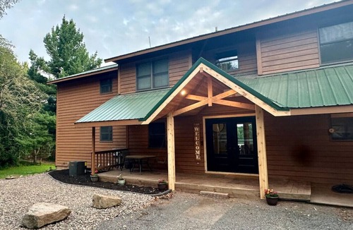 Osceola House | Lakefront Home with 6-person Hot Tub