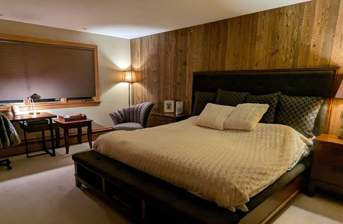 Woodstock House | Lakefront Retreat with Private Beach, Gourmet Kitchen, Game Room & Movie Space