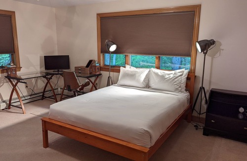 Woodstock House | Lakefront Retreat with Private Beach, Gourmet Kitchen, Game Room & Movie Space