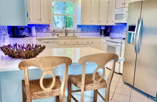 Florence House | Lakefront Two-Level Home Sleeps 10 - 4 Queen Beds, 2 Kitchens, Covered Parking
