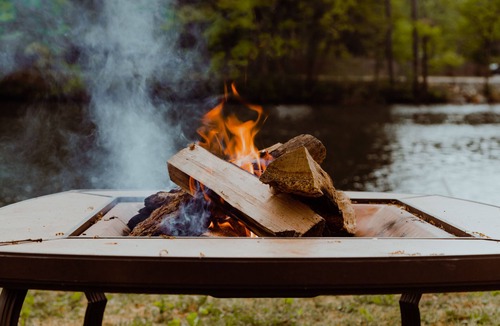 Westminster Cottage | Lakefront; view of ski mountain, firepit, dock, kayaks, paddle board