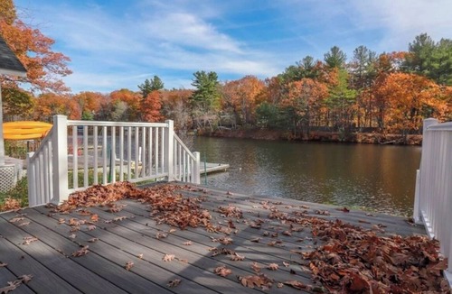 Westminster Cottage | Lakefront; view of ski mountain, firepit, dock, kayaks, paddle board