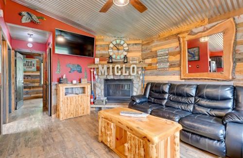 Holcombe House | Lakeside Cabin with Fire Pit Near Pine Point Park!