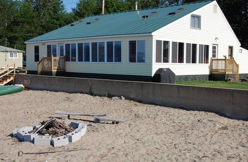 Malletts Bay House | Lakeside cottage w/mountain views, canoes, firepit, enclosed porch, bbq, beach