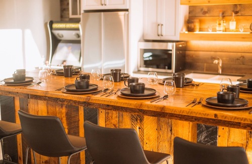 Minong Cabin | Lakeside Mansion 10000SF - Heated Pool - Two Hot Tubs - Theater- Sleeps up to 62