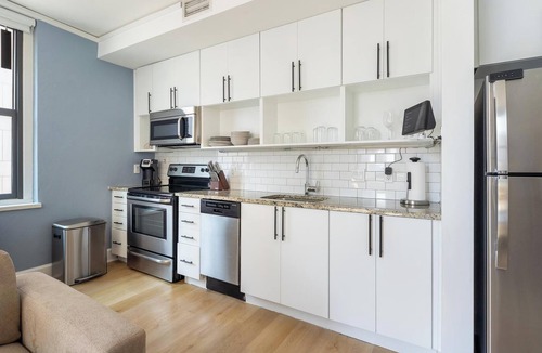 Financial District Apartment | Landing | Chic Studio, Yoga Studio, Pool
