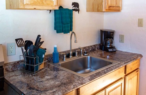 Red River Cabin | Located on the river, facing the Mountains