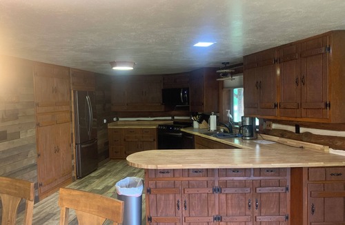 Irma Cabin | Log Cabin on 40 acres with a private lake