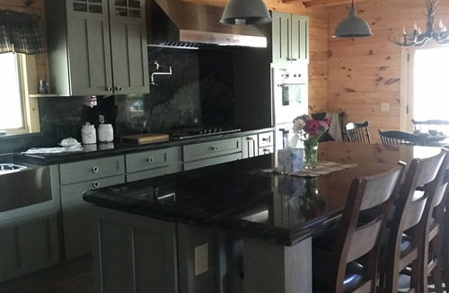 Meredith Cabin | Luxury Log home steps from private beach in Meredith on Lake Winnipesaukee.