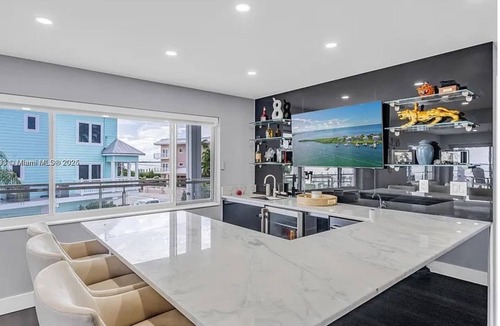 Buccaneer Point Ski Chalet | Luxury Oceanfront Mansion With Sea Access, Including a Private Boat and Jet Ski.