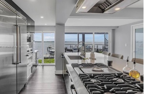 Buccaneer Point Ski Chalet | Luxury Oceanfront Mansion With Sea Access, Including a Private Boat and Jet Ski.