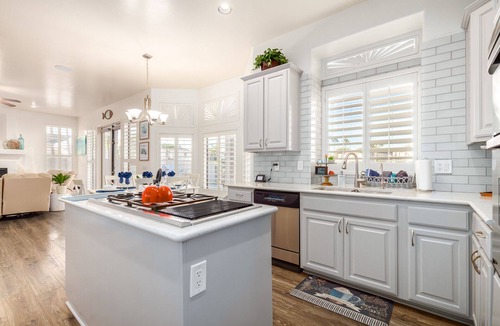 Val Vista Lakes House | Luxury Waterfront Home w/GAME ROOM & HEATED POOL