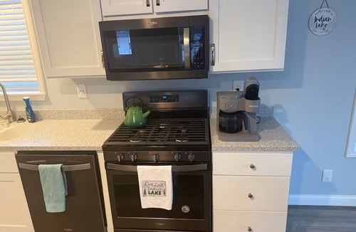 Russells Point House | Marvelous 3-bedroom lakefront house in Russells Point w/boat dock & fire pit