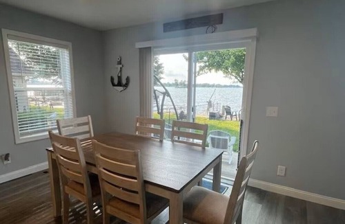 Russells Point House | Marvelous 3-bedroom lakefront house in Russells Point w/boat dock & fire pit