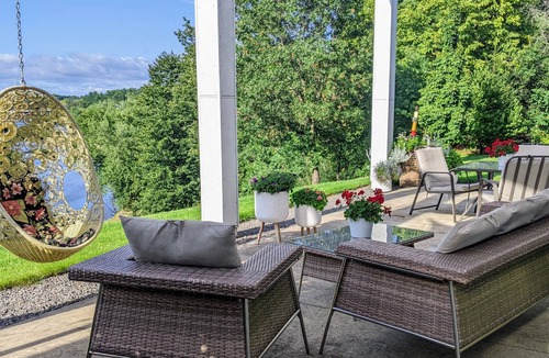 Black River Falls Apartment | Mid-Century Modern on the River