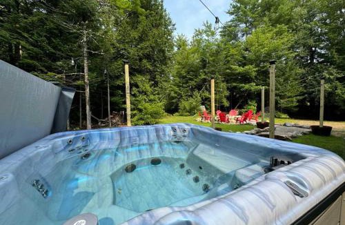 Conway House | Mitten Pines Cabin Hot Tub Fire Pit